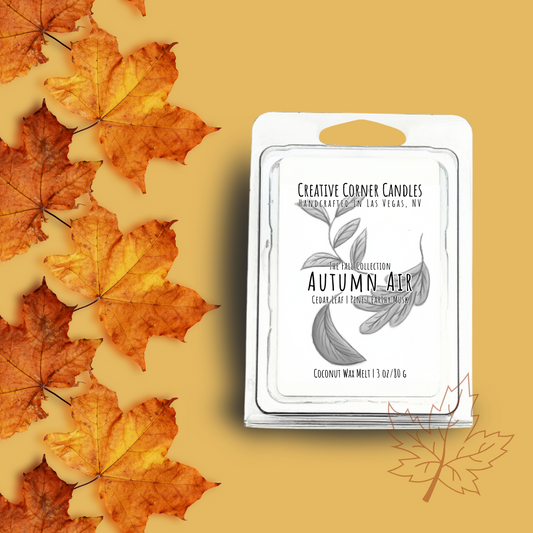 Autumn Air wax melts with cedar leaf, amber, and earthy musk scent in coconut soy blend, hand-drawn label illustration of autumn leaves.