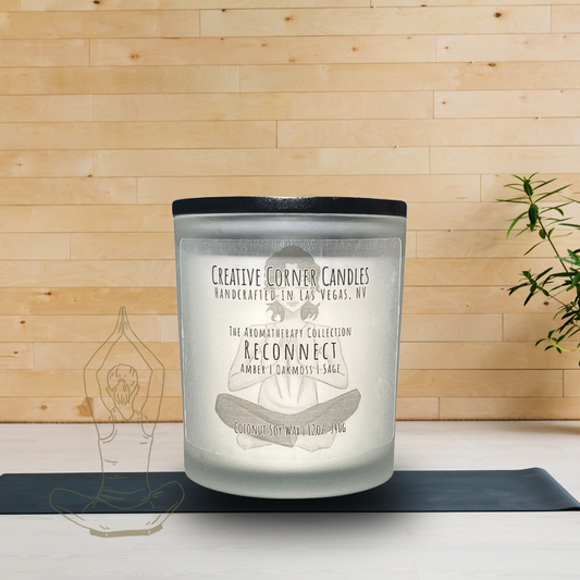 Reconnect handcrafted candles with an energizing scent and a label featuring a hand-drawn illustration of a woman doing the Sukhasana yoga pose