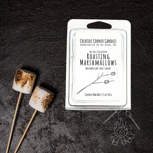 Roasting Marshmallows wax melts with marshmallow, oak, and smoky scent in coconut soy blend, hand-drawn label illustration of a stick with two marshmallows roasting.