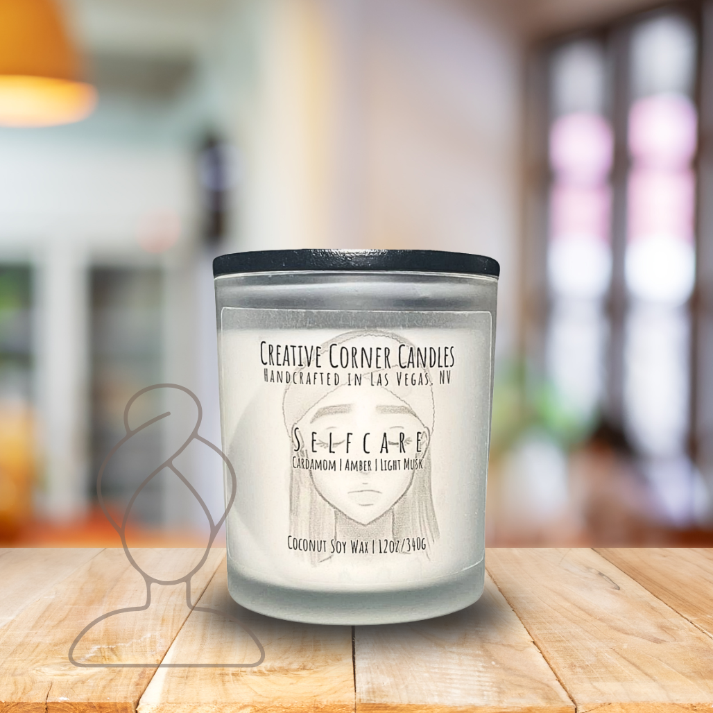 Selfcare handcrafted candles with a gentle, rejuvenating scent and a label featuring a hand-drawn illustration of a woman's face with closed eyes and a spa headband.