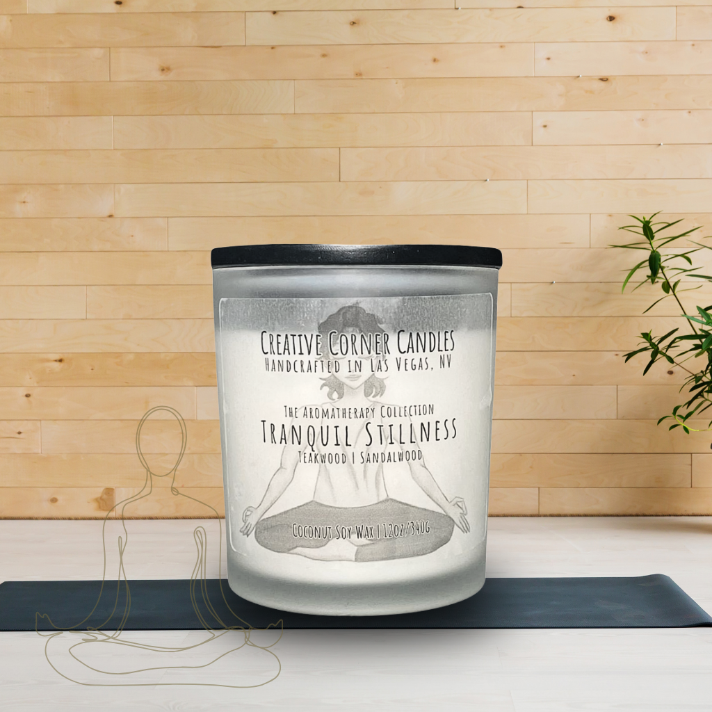 Tranquil Stillness handcrafted candles with a calming scent and a label adorned with a hand-drawn illustration of a woman doing a cross-legged yoga pose