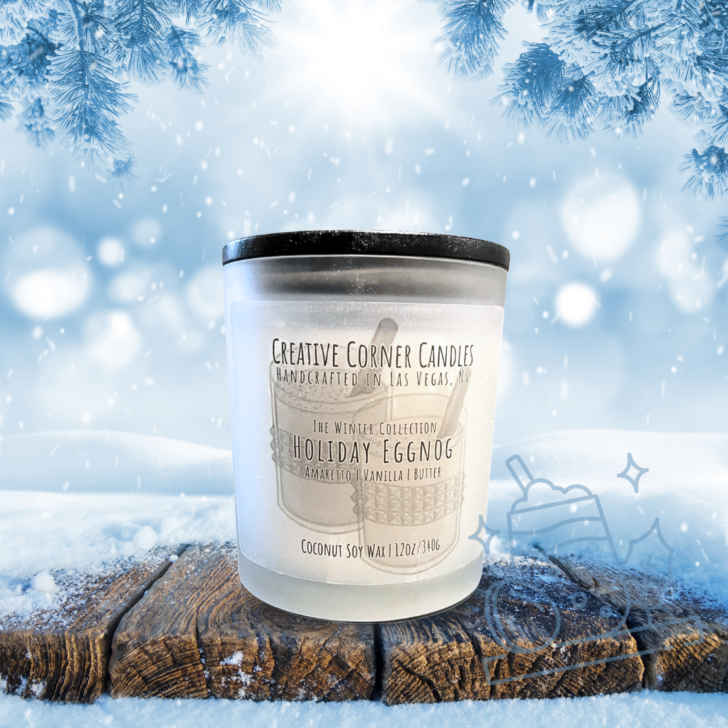 Candle labeled 'Holiday Eggnog' from Creative Corner Candles on a snowy background with Christmas decorations.