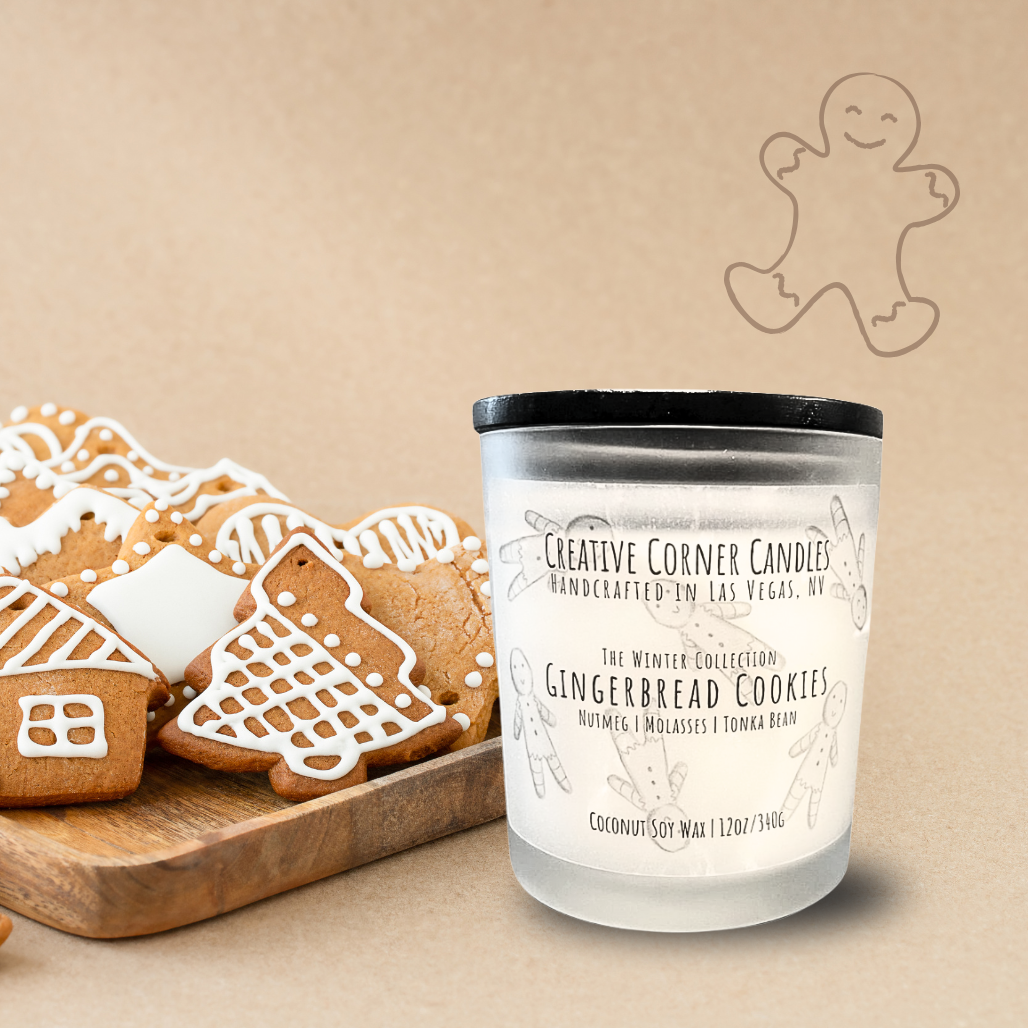 Gingerbread cookies on a wooden board with a candle labeled 'Gingerbread Cookies' by Creative Corner Candles on a beige background.