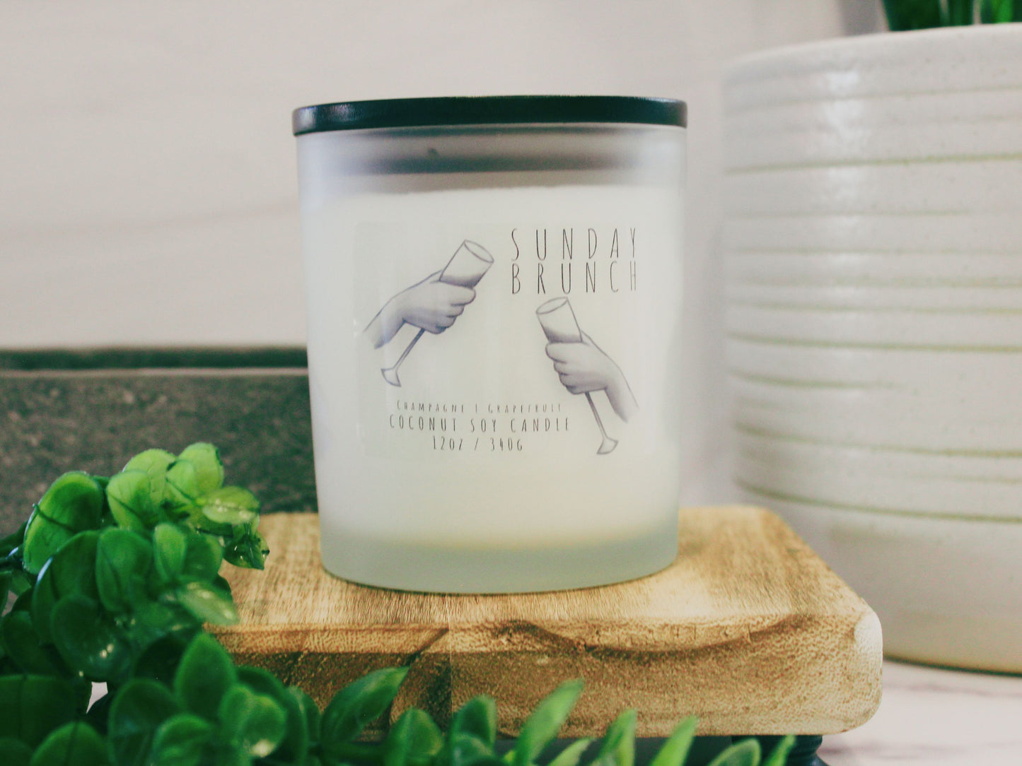 Indulge in the delightful aroma of 'Sunday Brunch,' a Coconut Soy Candle. Housed in an exquisite glass jar, this hand-poured candle casts a warm, inviting glow. The label showcases a brunch-themed design, capturing the essence of a leisurely Sunday morning. Enjoy a fragrant blend of coconut and soy wax, creating a long-lasting and clean burn. Elevate your space with the cozy and comforting vibes of 'Sunday Brunch' candle. Perfect for enhancing your home ambiance. Shop now for a touch of weekend relaxation.